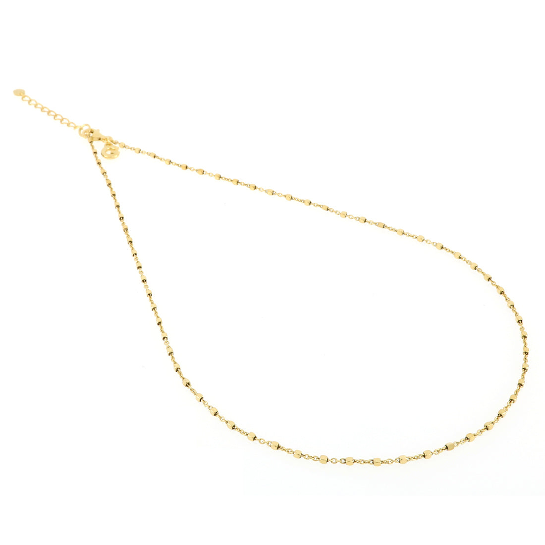 Collana basic oro con piccolissimi dadini che riflettono la luce