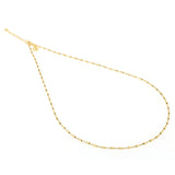 Collana basic oro con piccolissimi dadini che riflettono la luce