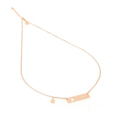 Collana oro rosa con targhetta forata e stellina
